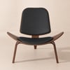 Poltrona Bassa in Ecopelle con Base a Treppiede in Legno
