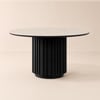 Aura 47" Round Black Faux Travertine Sintered Stone Dining Table, Fluted Base, Seats 4