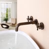 Melro Classic Wall Mounted Double Cross Handle Bathroom Basin Mixer Tap in Antique Brass