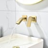 Brushed Gold Waterfall Bathroom Sink Faucet with Swirling Spout Wall-Mounted Solid Brass