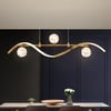 4-Light LED Linear Kitchen Island Lighting in Gold with Glass Globe Shade Dimmable