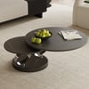 Table basse extensible noire avec socle en métal en forme d'anneau