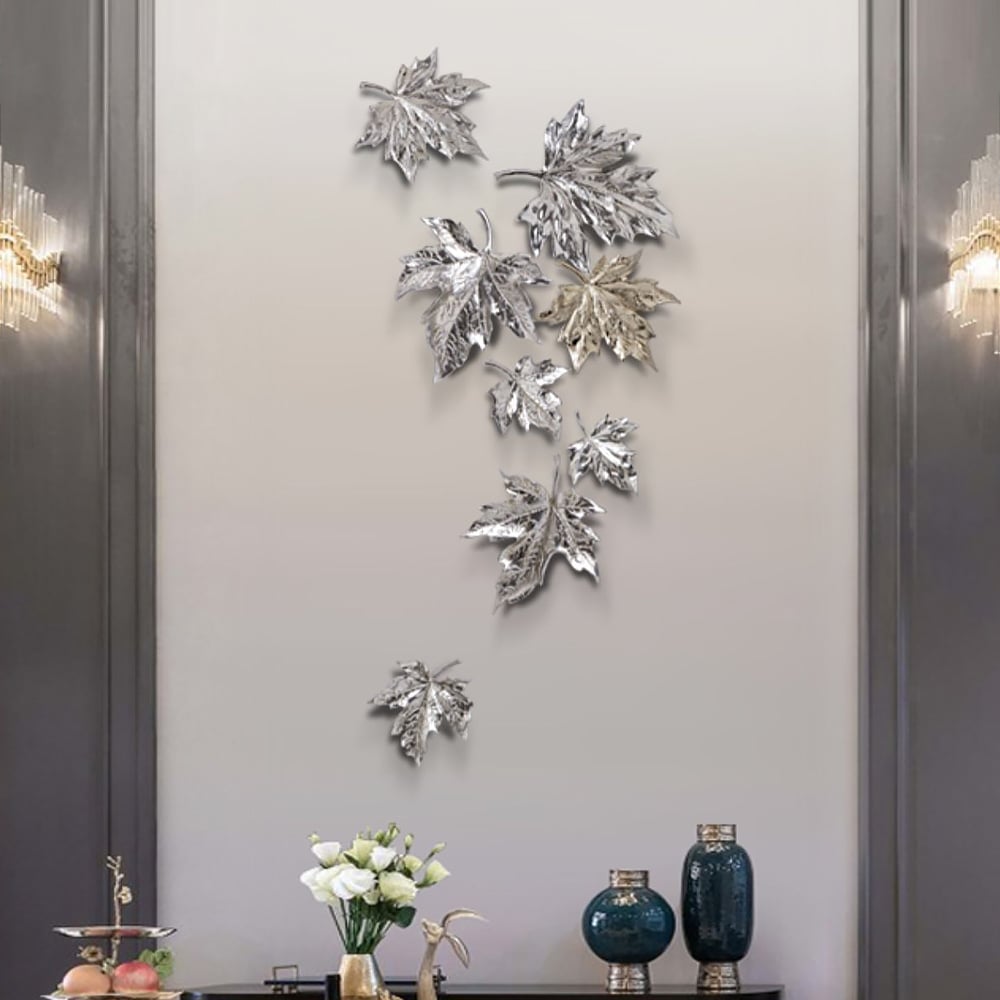 Questions et Réponses pour 8 pièces de décoration murale moderne en métal 3D, feuilles d'érable, or et argent, dans le salon