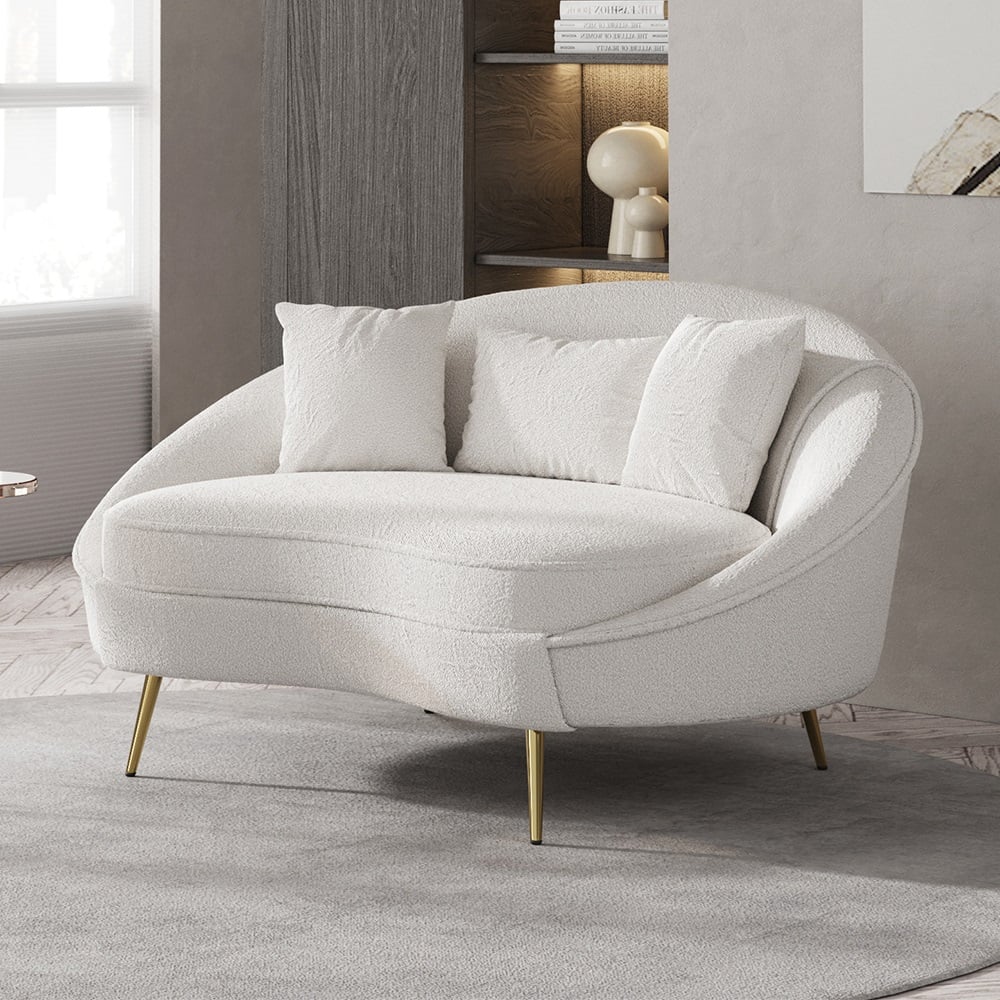 Perguntas e respostas para Sofá curco 2 plazas en bouclé con patas doradas y cojines 160 cm