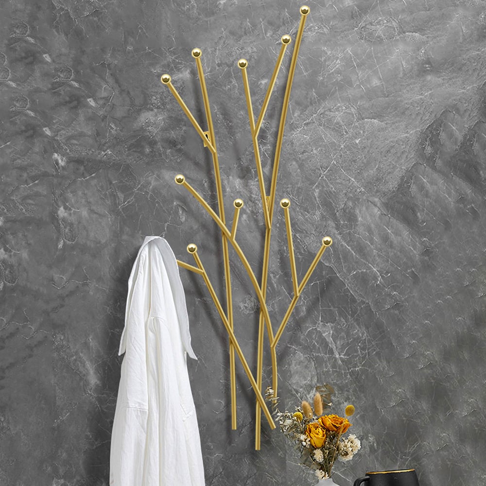 Fragen und Antworten zu Moderner Kleiderständer mit 11 Haken zur Wandmontage in Gold mit Astform