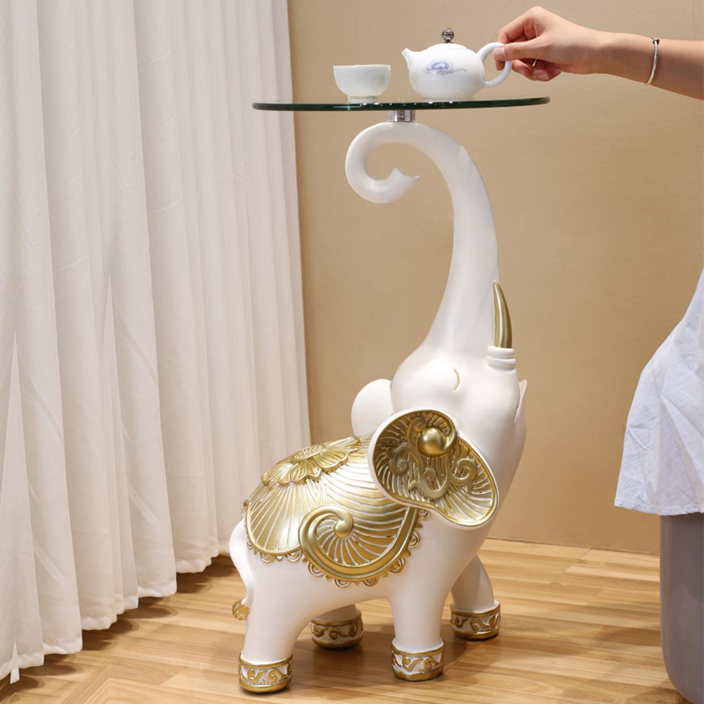 Vragen en antwoorden voor White Elephant bijzettafel in goudkleurige afwerking, moderne bijzettafel met doorzichtig glazen tafelblad