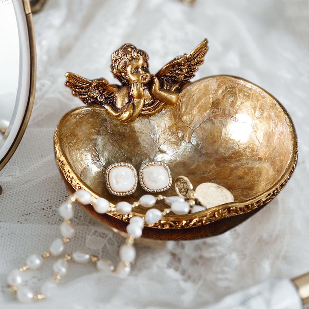 Questions et Réponses pour Plateau de rangement décoratif Shellium en forme d'ange en bronze vintage