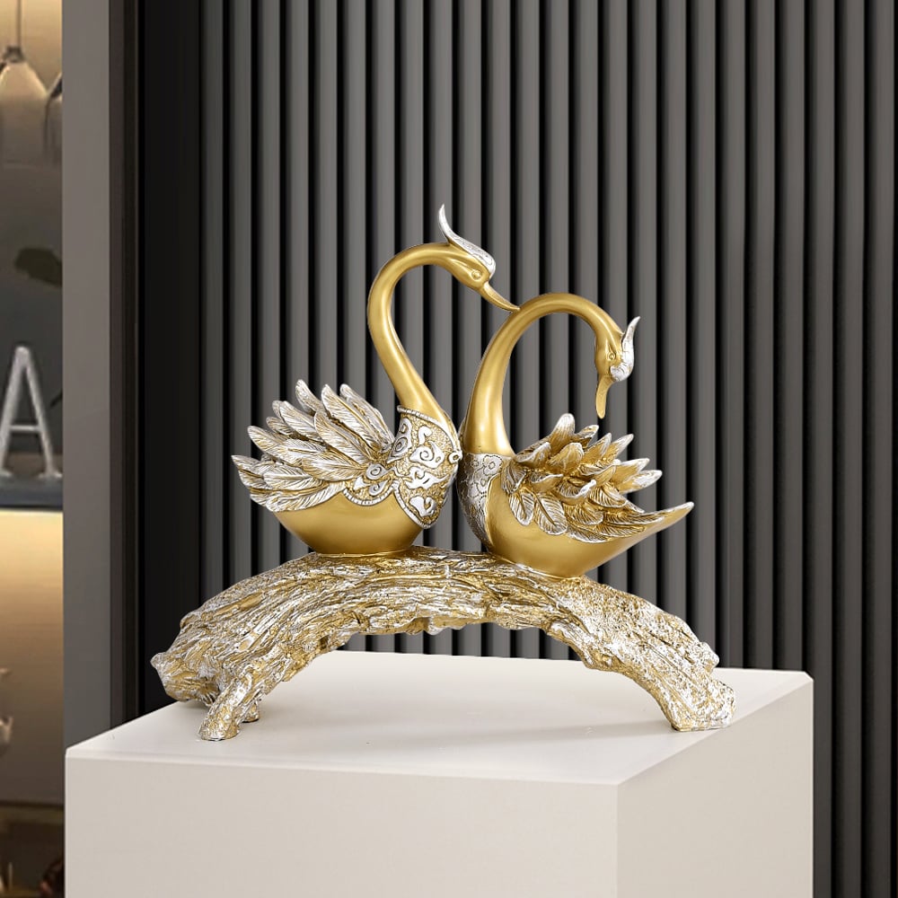 Vragen en antwoorden voor 360 mm gouden moderne simulatie koppel zwaan sculptuur kunstornament thuistafel standbeeld decor