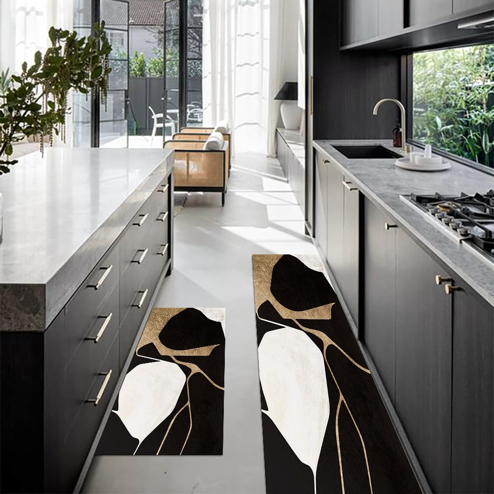 Pytania i odpowiedzi dla 2PCS Abstrakcyjna złota i czarna mata do biegania diatom Antypoślizgowy chłonny zestaw dywanów kuchennych