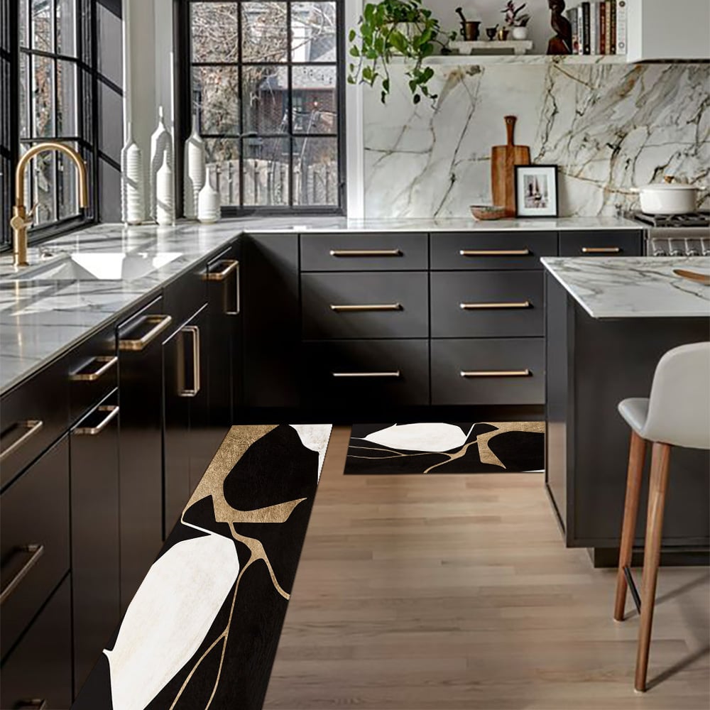 Pytania i odpowiedzi dla 2PCS Abstrakcyjna złota i czarna mata do biegania diatom Antypoślizgowy chłonny zestaw dywanów kuchennych