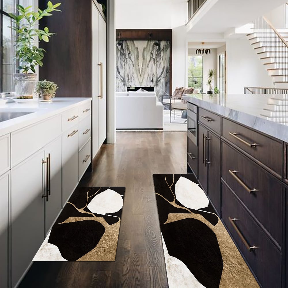 Pytania i odpowiedzi dla 2PCS Abstrakcyjna złota i czarna mata do biegania diatom Antypoślizgowy chłonny zestaw dywanów kuchennych