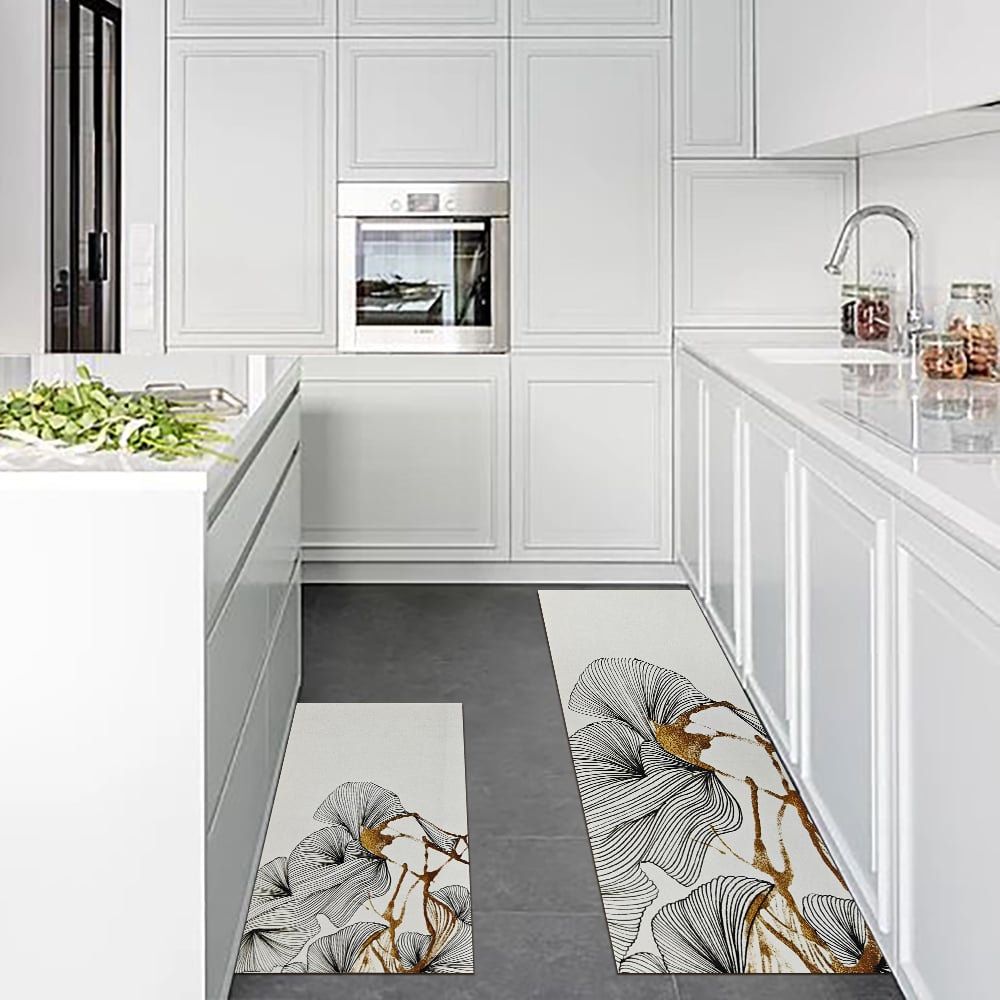 Questions et Réponses pour Tapis de cuisine géométrique abstrait doré, 2 pièces, ensemble de tapis de cuisine antidérapants et absorbants