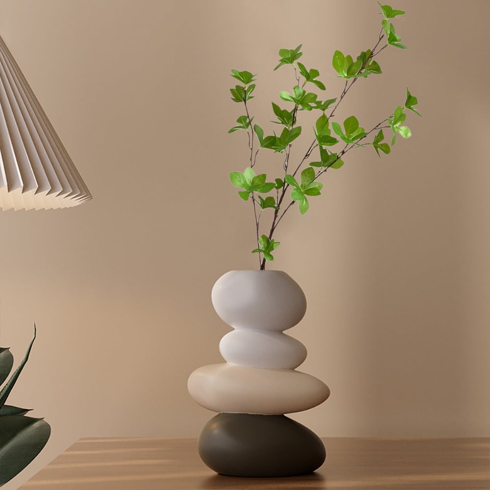 Questions and Answers for Resin Stacked Stone Vase with Faux Indoor Plant Decor Art