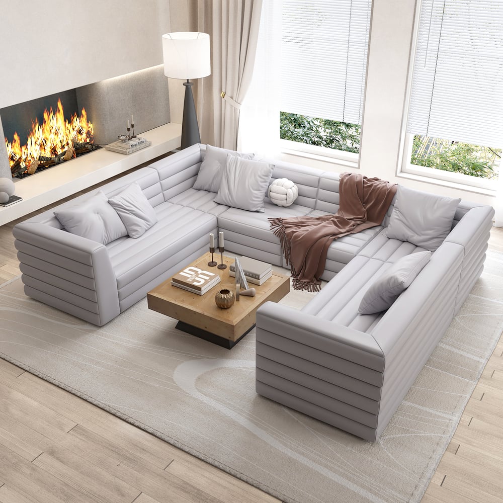 Questions et Réponses pour Canapé sectionnel modulaire moderne en cuir microfibre gris en forme de U de 3200 mm pour 8 places
