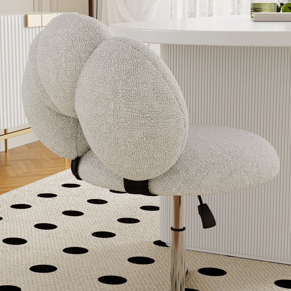 Pytania i odpowiedzi dla Nowoczesne regulowane obrotowe krzesła jadalne z wełny jagnięcej z tapicerką białe