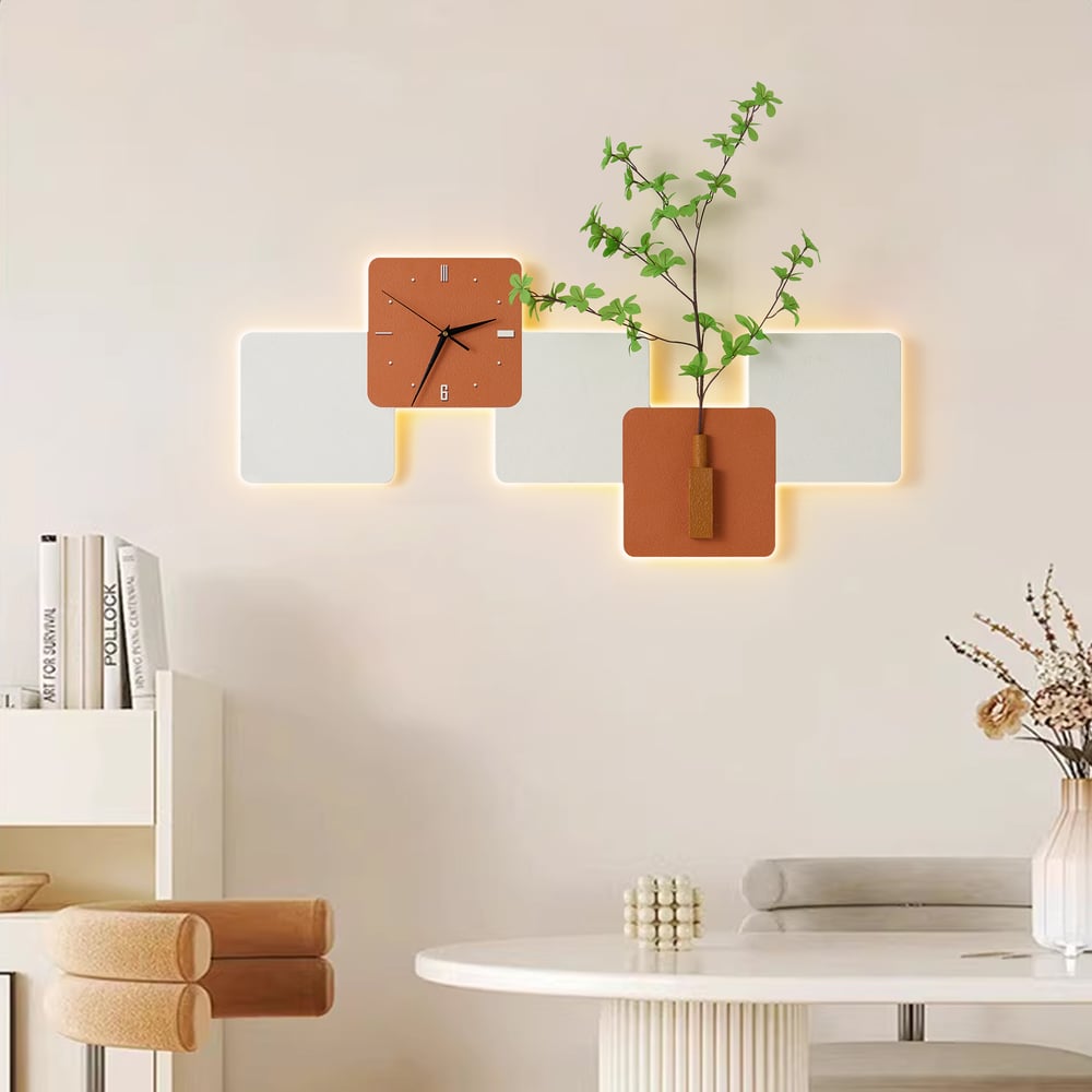 Questions and Answers for Modern LED Wall Clock with Faux Greenery – White & Orange, 1000mm x 450mm