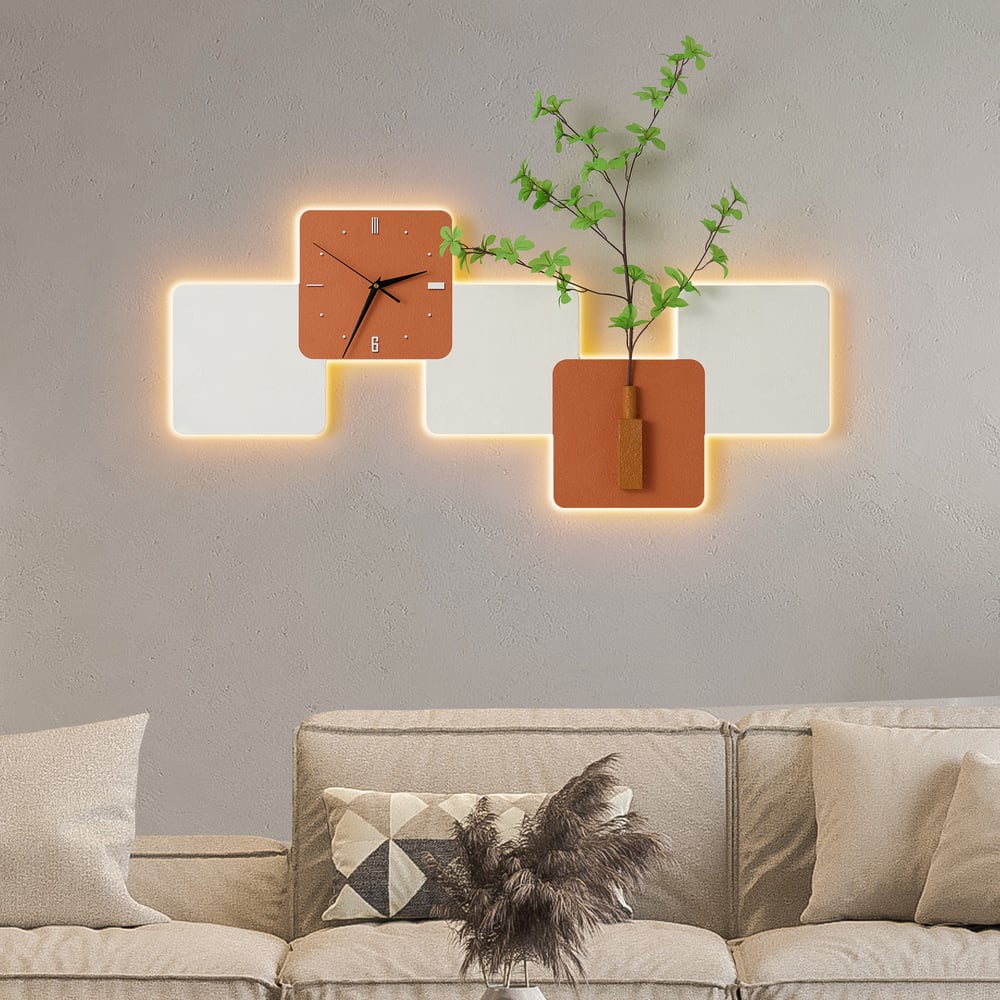 Questions and Answers for Modern LED Wall Clock with Faux Greenery – White & Orange, 1000mm x 450mm