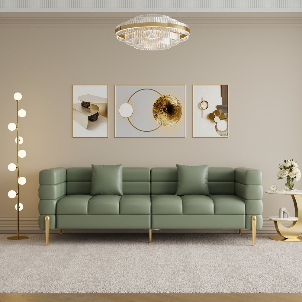 Fragen und Antworten zu Aurora Geriffeltes Sofa aus Kunstleder, 2010 mm, mit goldfarbenen Beinen und Kissen