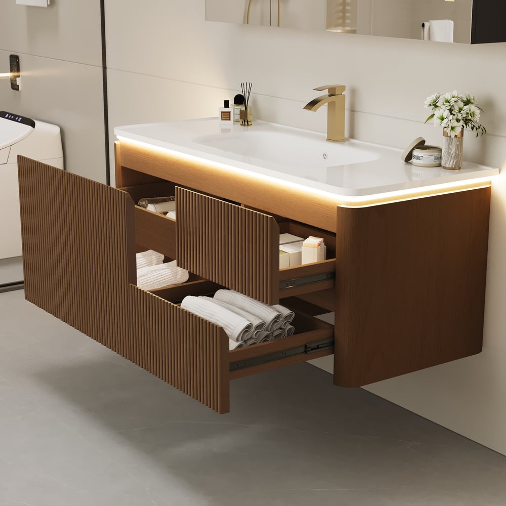 Questions et Réponses pour Meuble-lavabo mural cannelé moderne de 119 cm avec lavabo, éclairage LED doux et grand espace de rangement