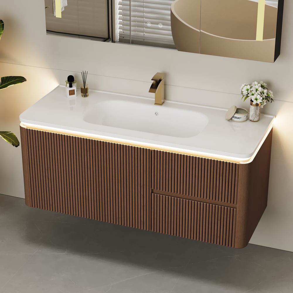 Questions et Réponses pour Meuble-lavabo mural cannelé moderne de 119 cm avec lavabo, éclairage LED doux et grand espace de rangement