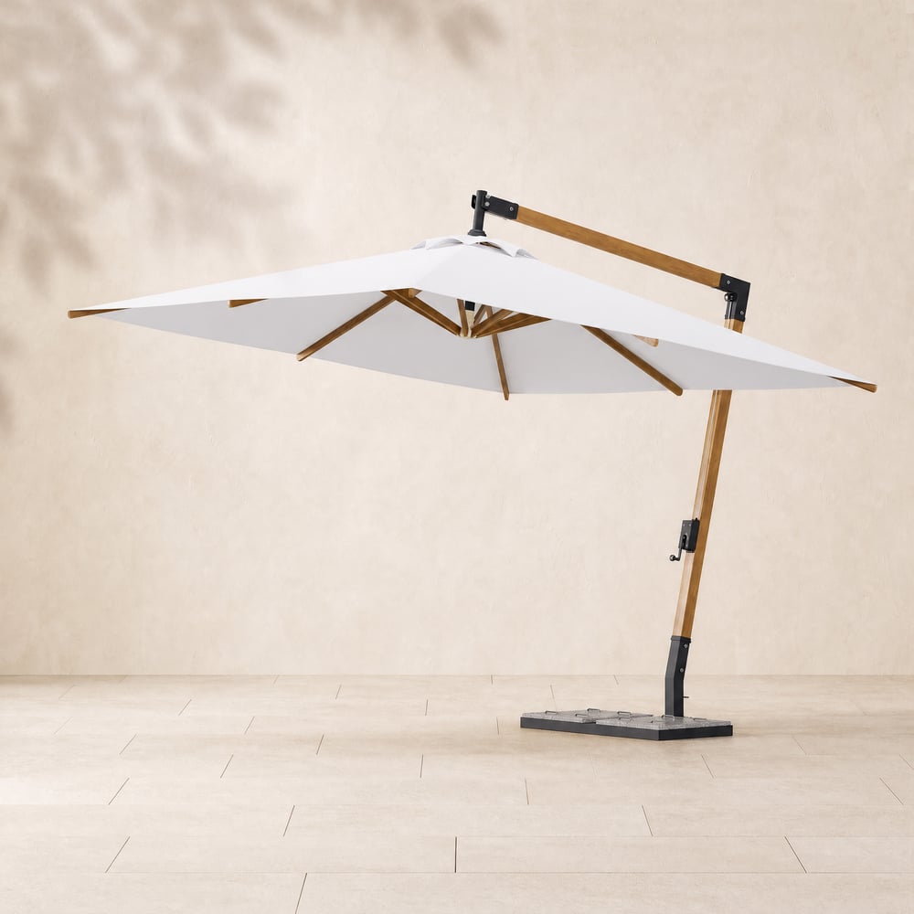Parasol déporté Tevara 270 cm blanc avec base en granit image de fenêtre