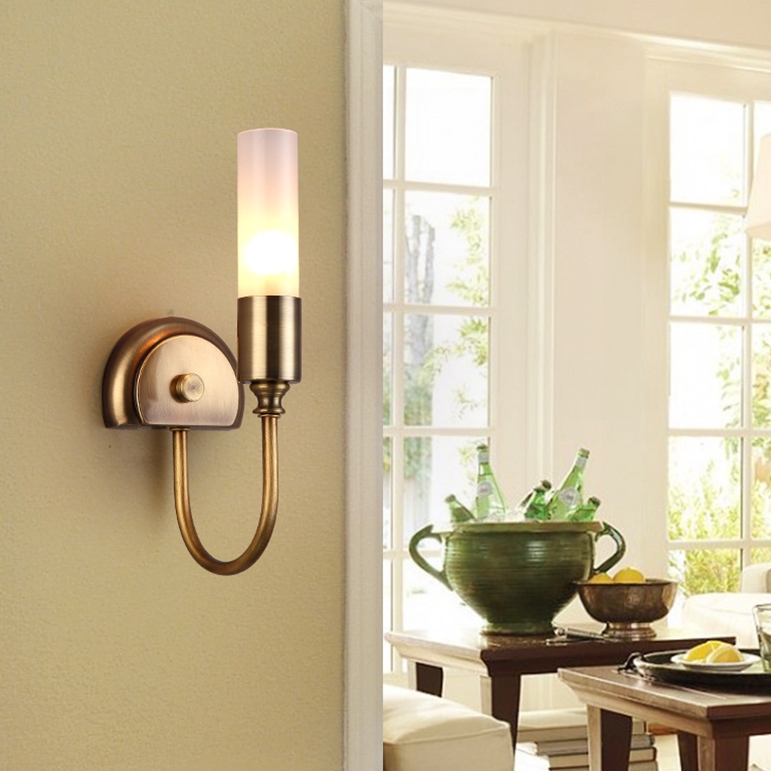 Rustic Cylinder Glass Shade 1-Light Indoor Wall Sconce with Curved Arm in Brass window image