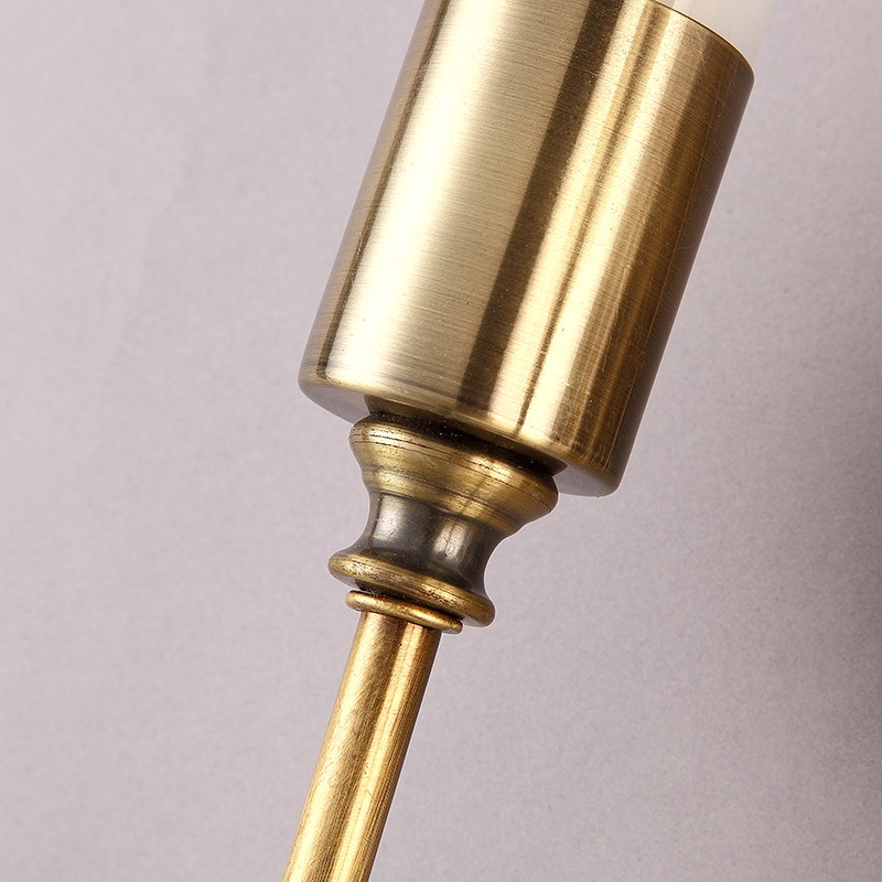 Rustic Cylinder Glass Shade 1-Light Indoor Wall Sconce with Curved Arm in Brass window image