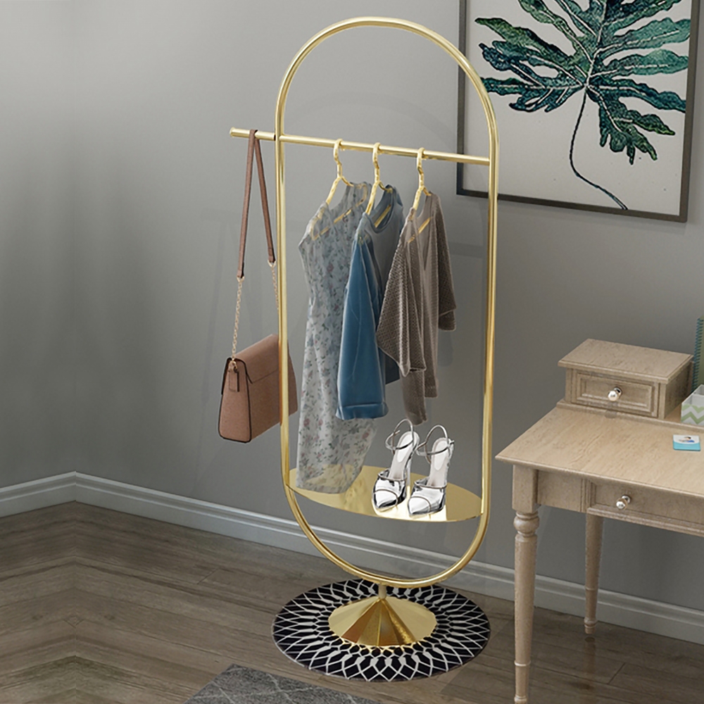 Gold Clothing Rack with Shelf and Hanging Oval Shape window image