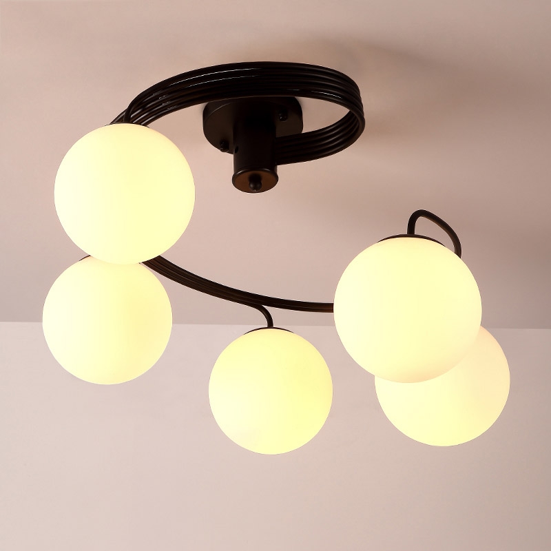 Modern Globe Glass Shade Black Metal Swirl Arm 3-Light Semi Flush Mount Ceiling Light window image