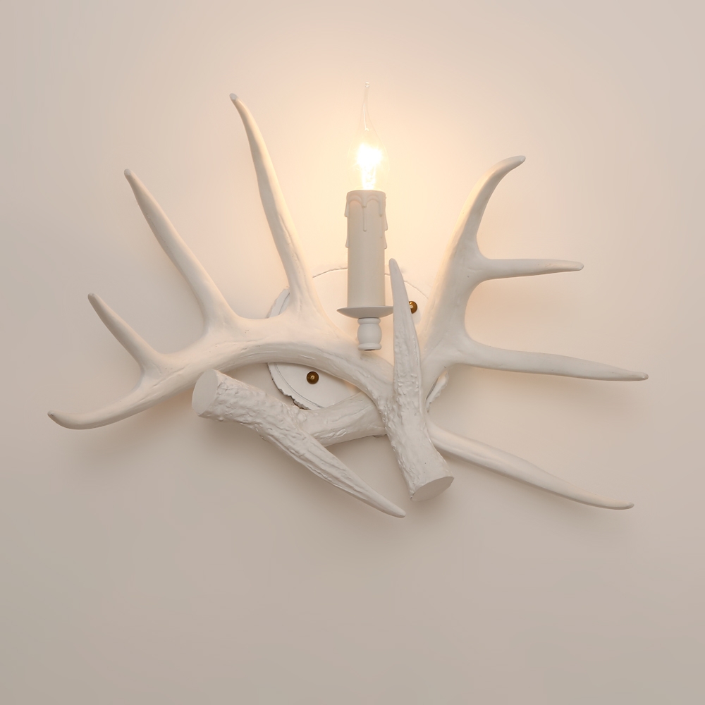 Lodge Solid White Resin Faux Deer Antler Indoor Wall Sconce with 1 Candle Light window image