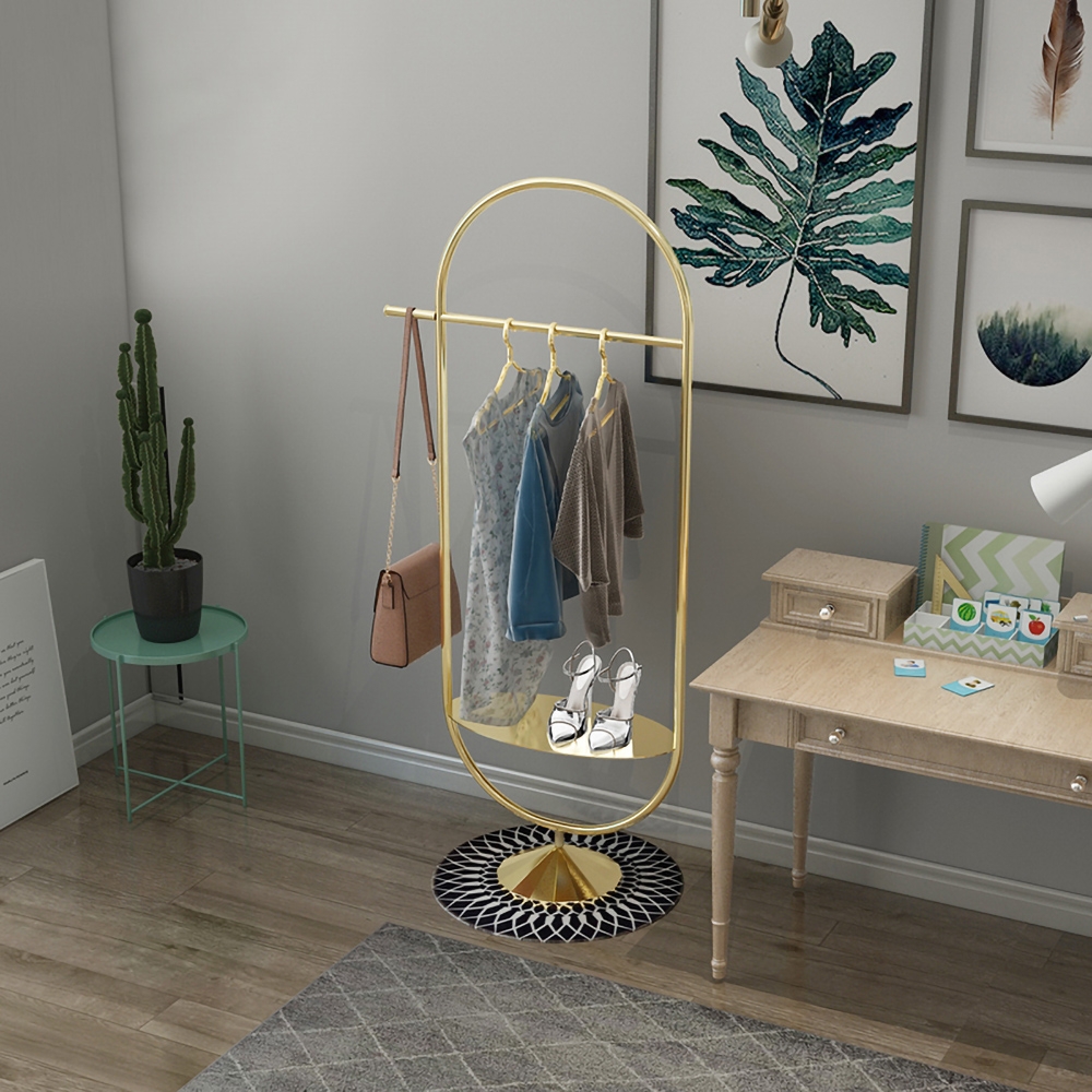Gold Clothing Rack with Shelf and Hanging Oval Shape window image