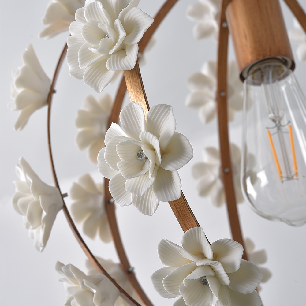 Faye Modern White Ceramic Flowers 1-Light Wrought Iron Globe Pendant Light in Gold Finish