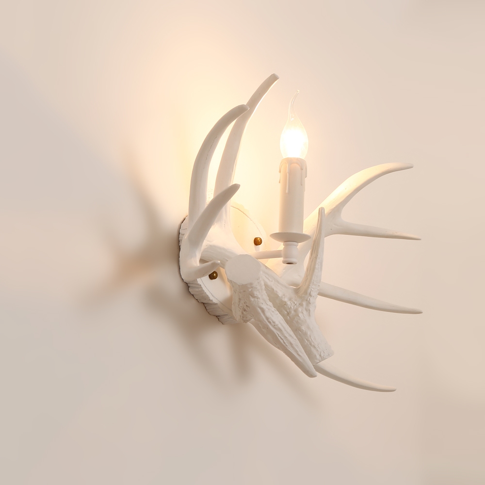Lodge Solid White Resin Faux Deer Antler Indoor Wall Sconce with 1 Candle Light window image