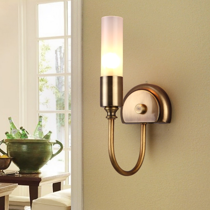 Rustic Cylinder Glass Shade 1-Light Indoor Wall Sconce with Curved Arm in Brass window image