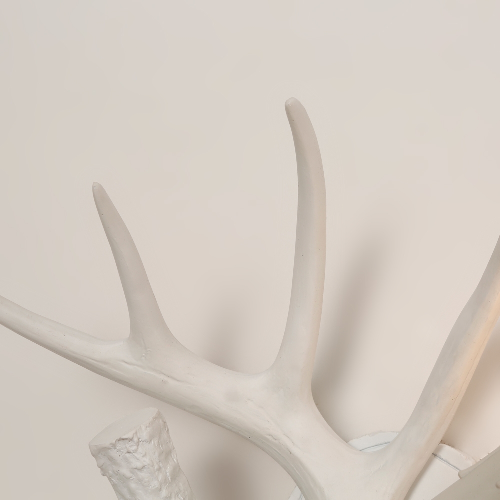 Lodge Solid White Resin Faux Deer Antler Indoor Wall Sconce with 1 Candle Light window image