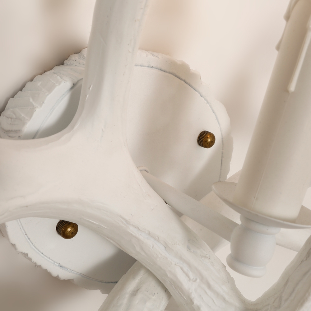 Lodge Solid White Resin Faux Deer Antler Indoor Wall Sconce with 1 Candle Light window image