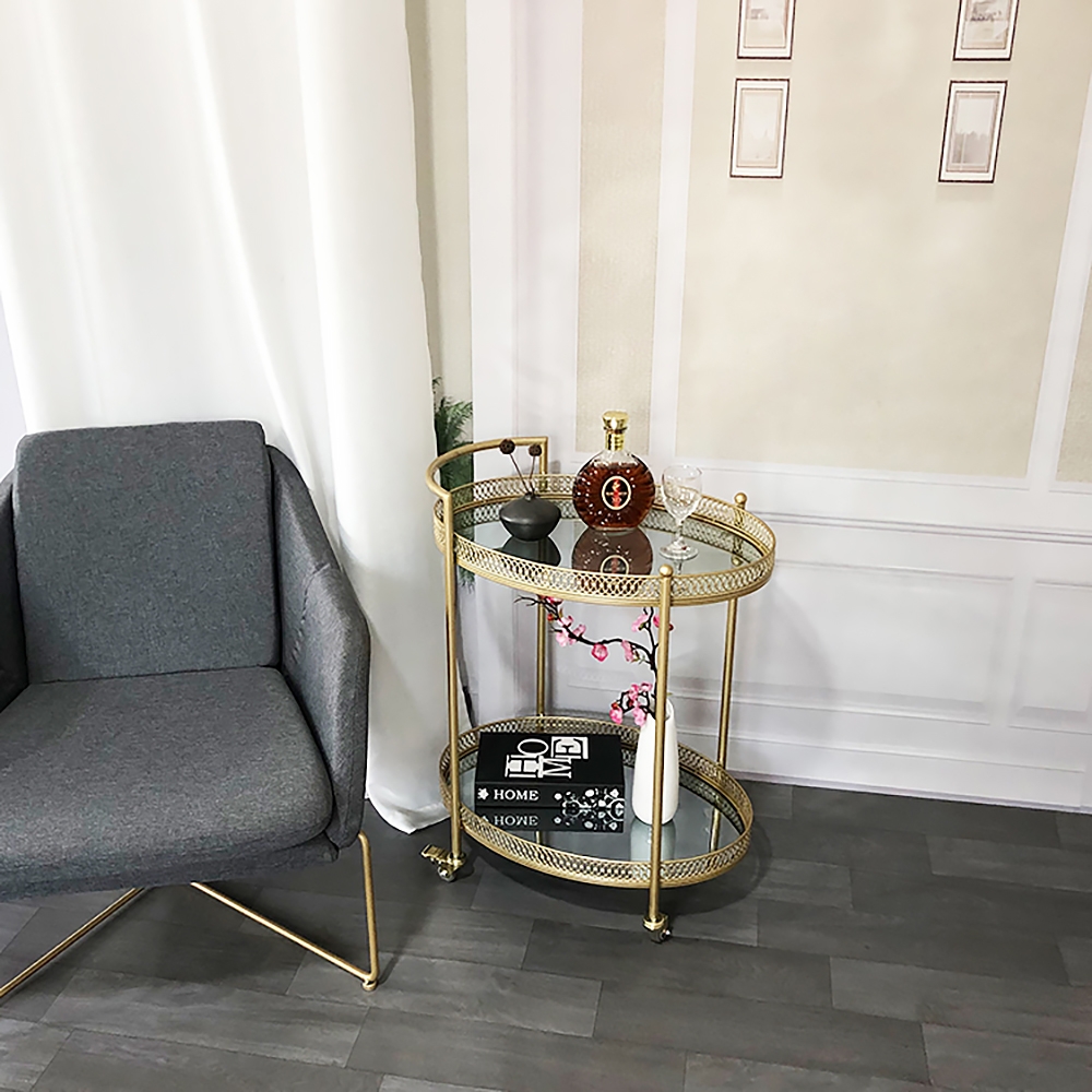 Gouden 23,6 „2-laags ovale rollende serveerbarwagen met handvat gespiegelde planken van gehard glas Vensterafbeelding