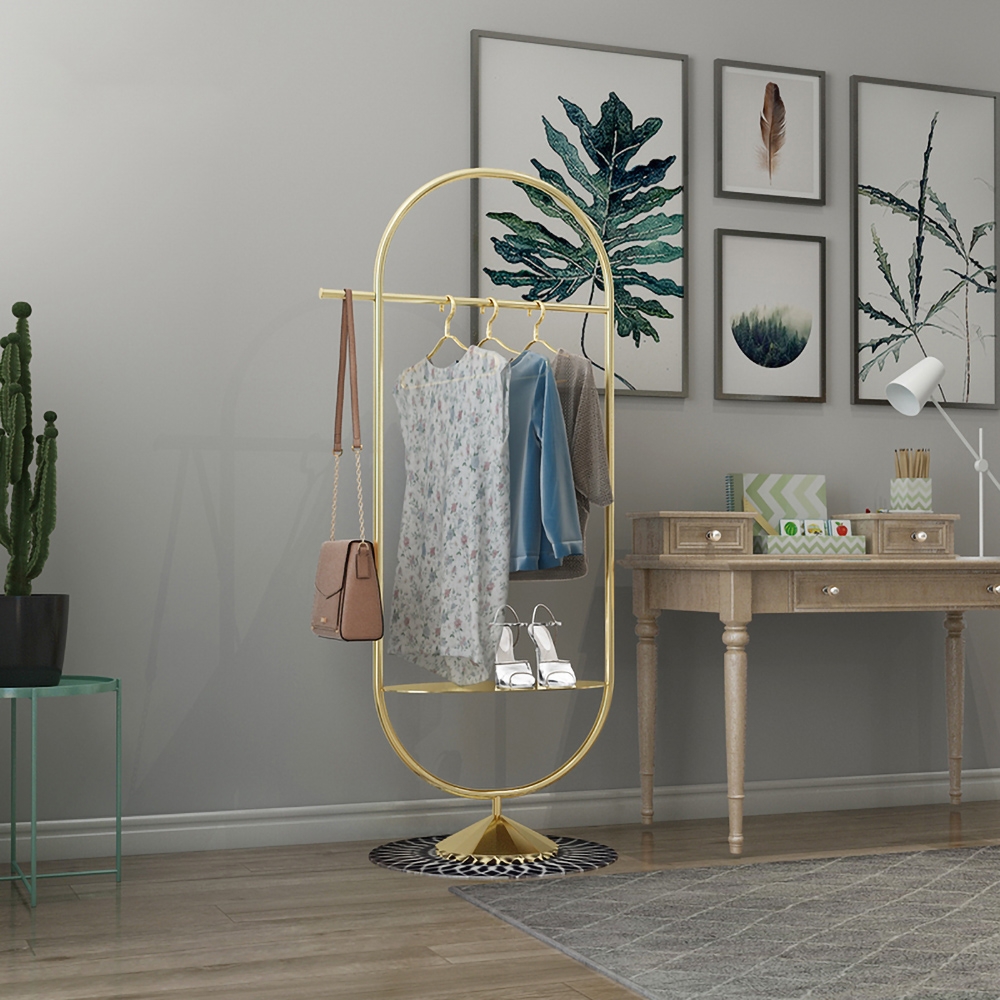 Gold Clothing Rack with Shelf and Hanging Oval Shape window image