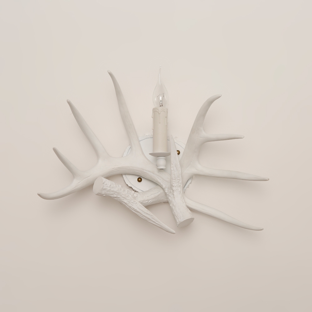Lodge Solid White Resin Faux Deer Antler Indoor Wall Sconce with 1 Candle Light window image