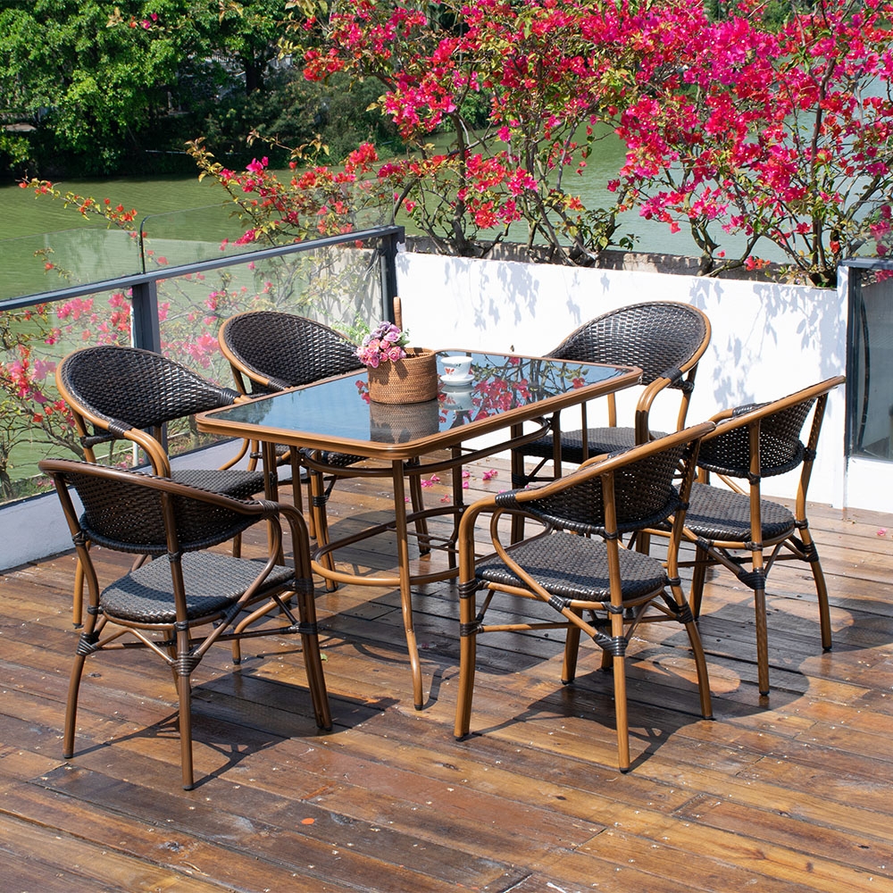 7-Pieces Rattan Patio Dining Set with Glass-top Trestle Table and 6 Rattan Armchair window image