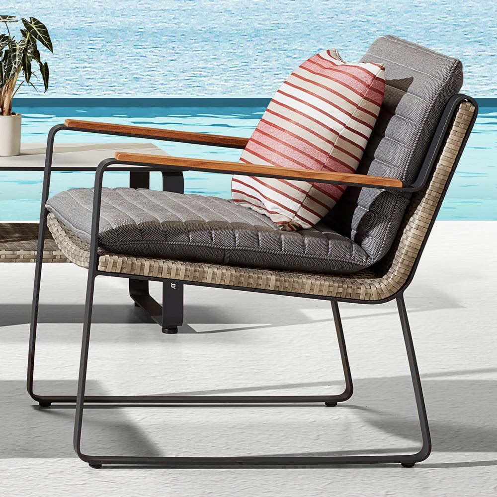 Rattan Woven Outdoor Accent Chair with Striped Cushion and Pillow window image