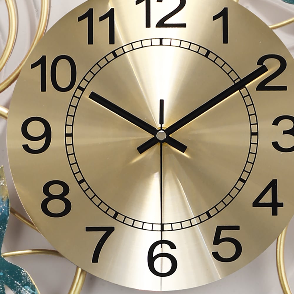 Style A Modern Maple Leaves Metal Wall Clock with Hollow-out Design window image