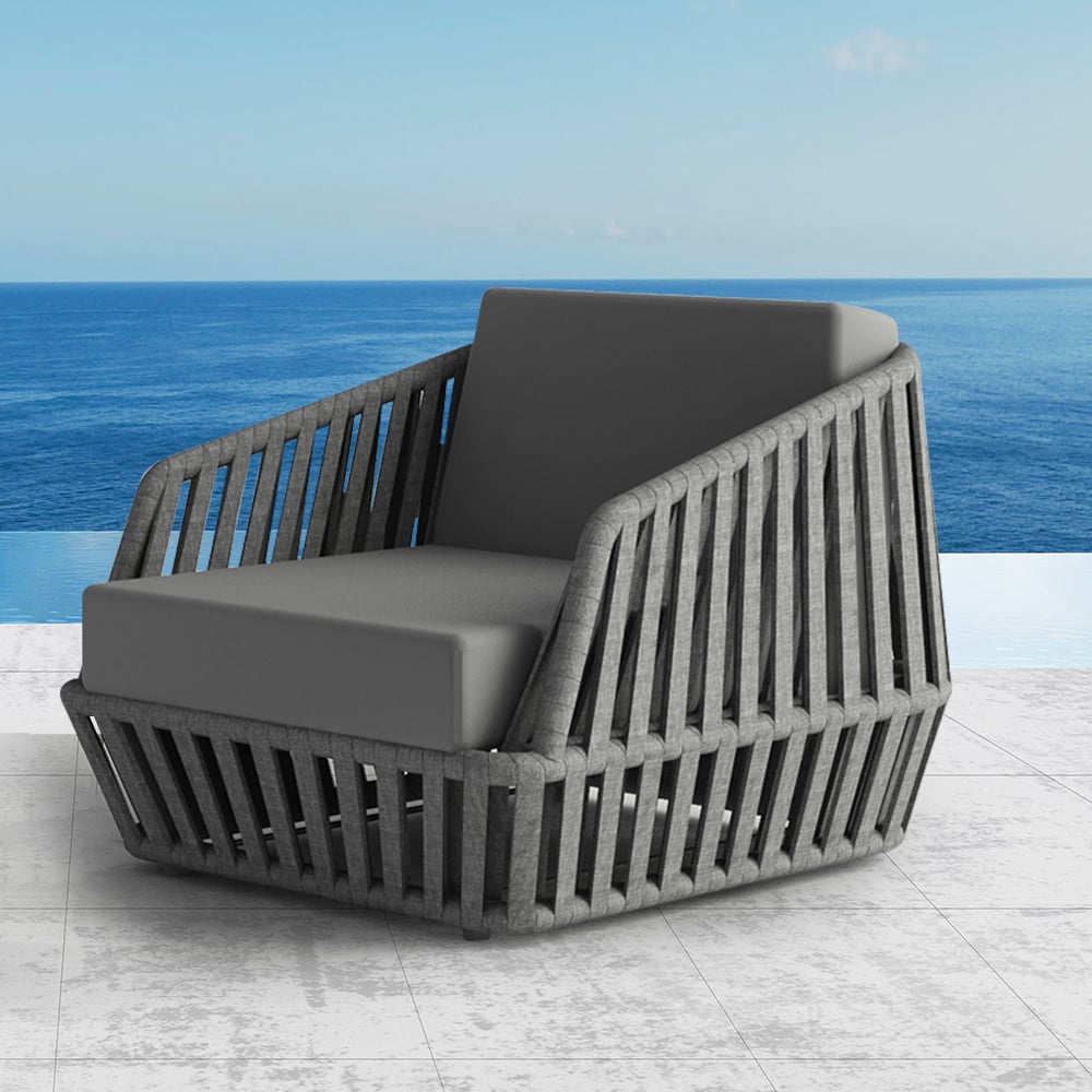 Grijze fauteuil voor buiten in zonwerend gevlochten touw met kussen Vensterafbeelding