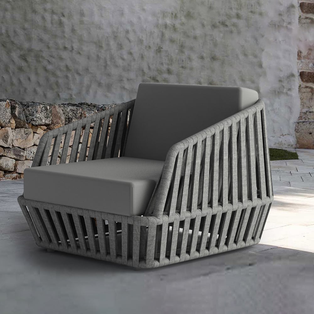 Grijze fauteuil voor buiten in zonwerend gevlochten touw met kussen Vensterafbeelding