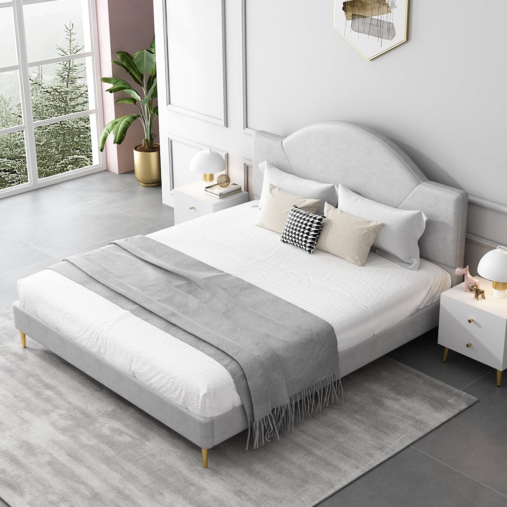 Cama tapizada circular moderna de cuero gris claro con pies redondos y medios dorados Imagen de ventana