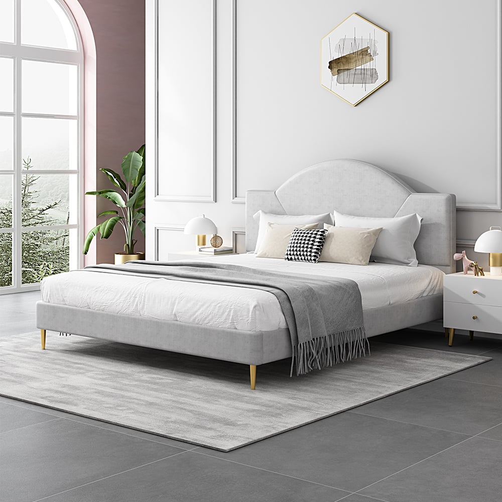 Cama tapizada circular moderna de cuero gris claro con pies redondos y medios dorados Imagen de ventana