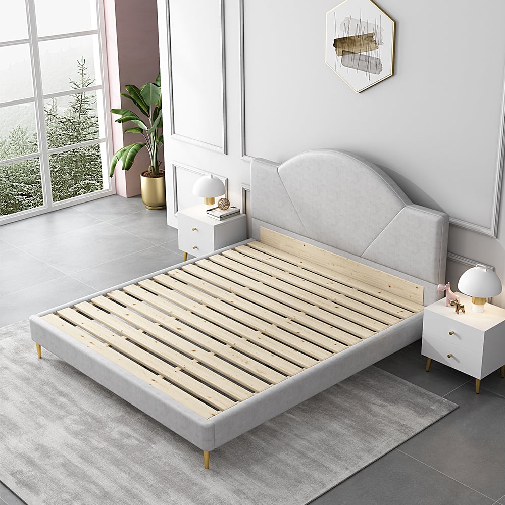 Cama tapizada circular moderna de cuero gris claro con pies redondos y medios dorados Imagen de ventana