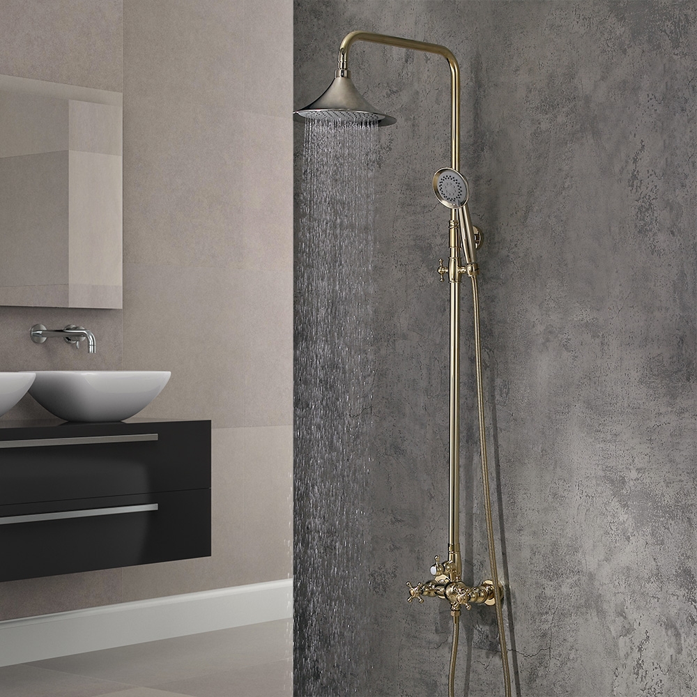 Pommeau de douche à effet pluie et mitigeur de douche à main rond et poignée croisée en laiton massif doré image de fenêtre