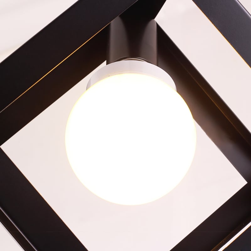 Modern Black Single-Light Pendant Light with Geometric Framework window image