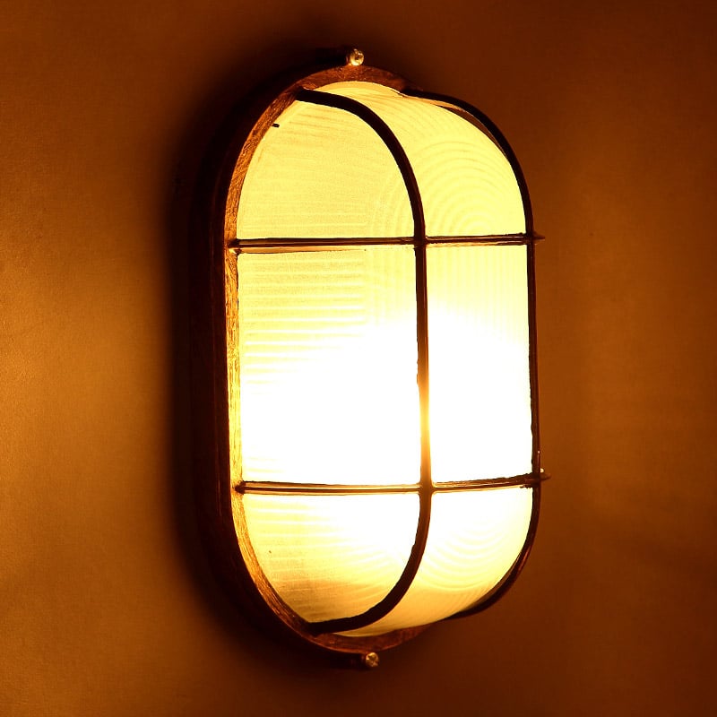 Industrial Glass Single Wall Sconce Wall Lamp with Metal Backplate in Rust window image
